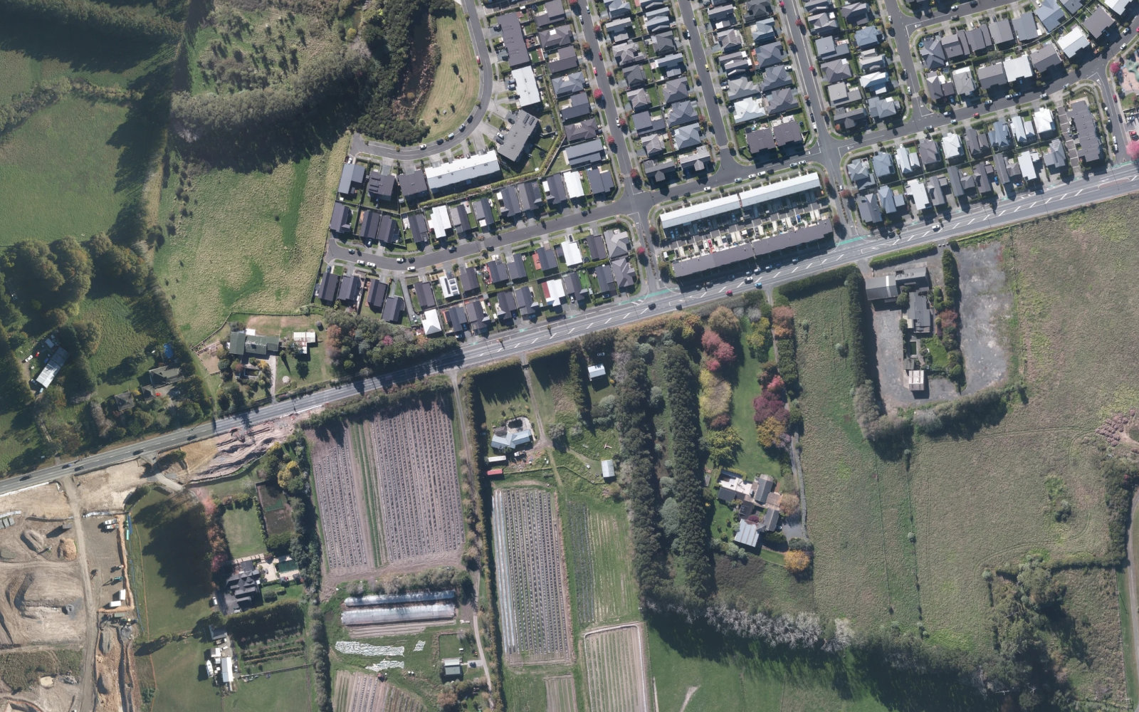 Aerial view around 37–39 Brigham Creek Road, Whenuapai. Location context only; no project boundaries shown.