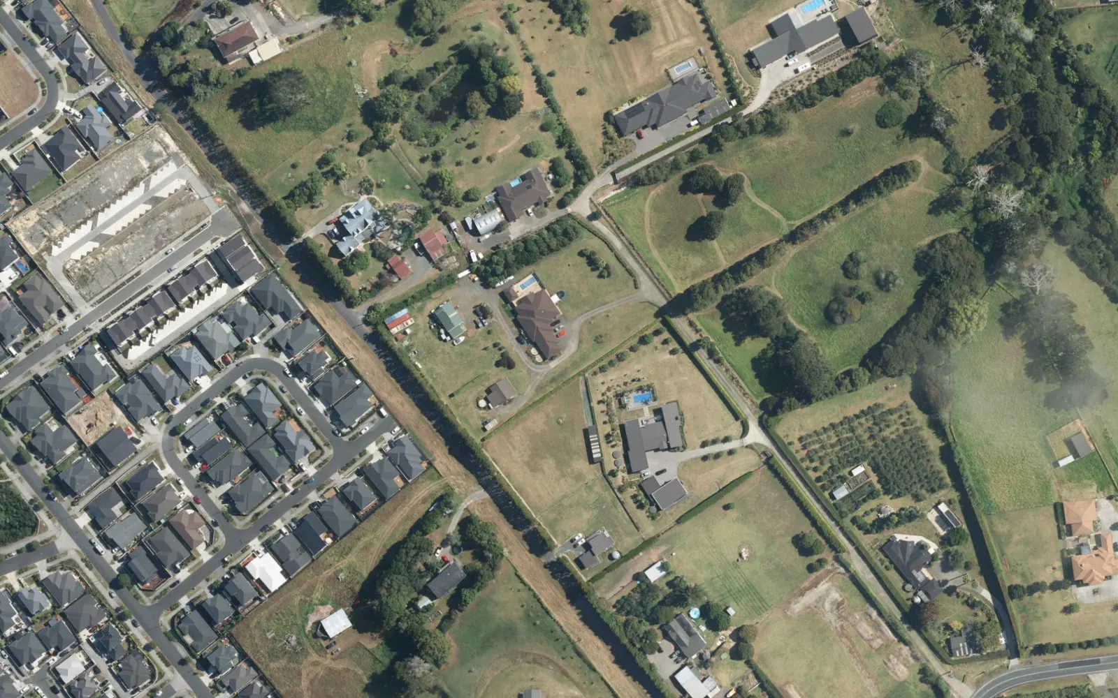 Aerial view around Oraha Road, Kumeū. Location context only; site boundaries are not shown.